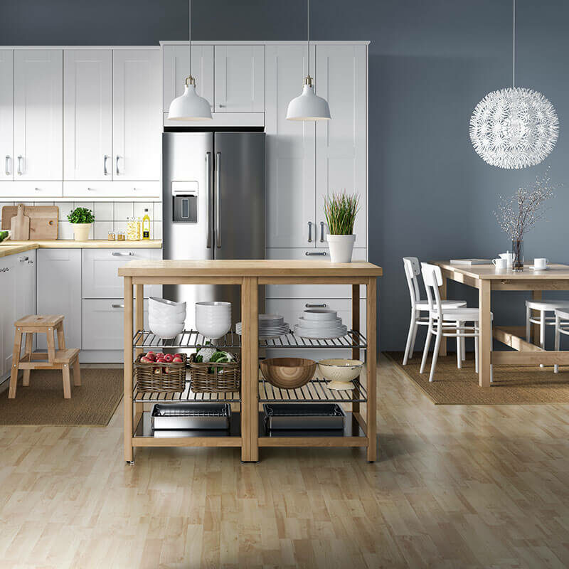 Spacious kitchen with laminate wood flooring