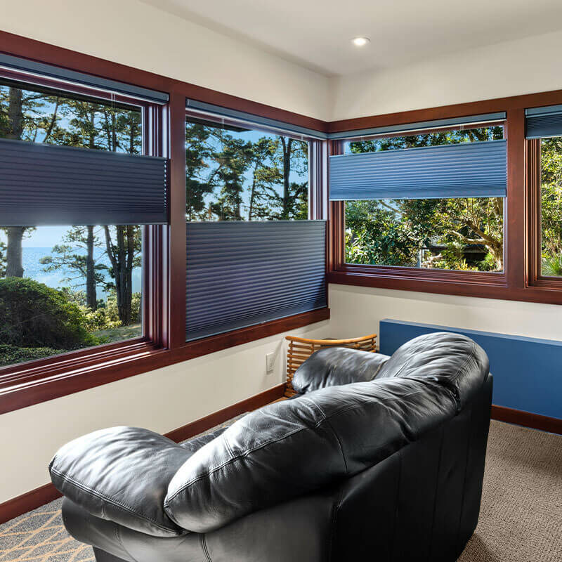 Custom window treatment blue blinds with varied openings