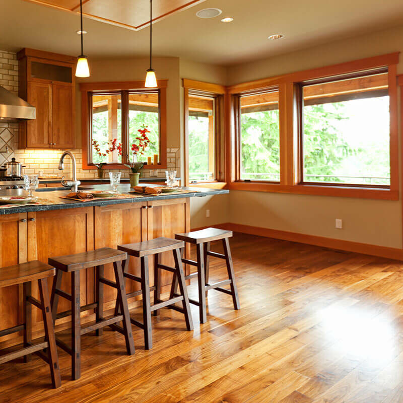 View of home kitchen with hardwood floors
